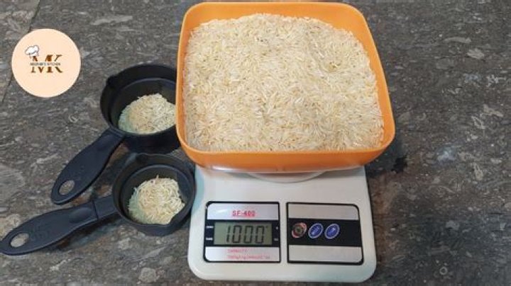 How much is 150 grams of rice in tablespoons?