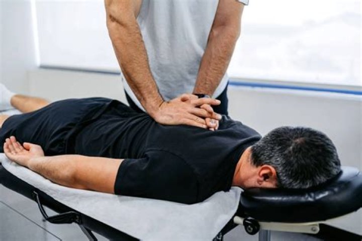 What do chiropractors use to stimulate muscles?