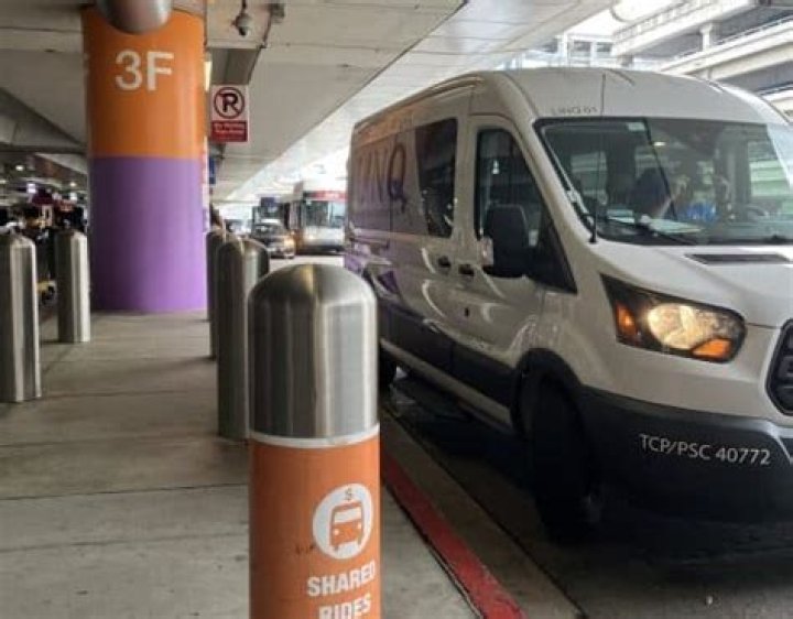 Where do hotel shuttles pick up at LAX?